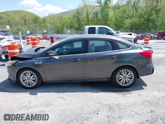 2018 Ford Focus Titanium с VIN 1FADP3J22JL314642, выставлен на аукционе IAAI как лот 42128194 с пробегом 62 787 миль миль и . История ставок и продаж доступна на DreamBid. Изображение 14.
