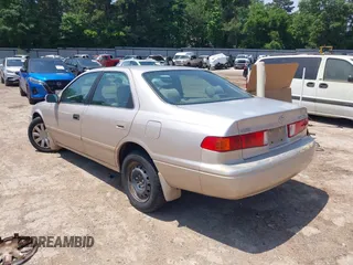 2000 Toyota Camry CE z VIN 4T1BG22K5YU731201, wystawiony jako IAAI lot #42094098 z przebiegiem Nie podano mil oraz . Historia ofert i sprzedaży dostępna na DreamBid. Obrazek 3.