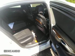 2017 BMW 7 Series 750i with VIN WBA7F0C35HGM21649, listed as a IAAI auction lot 37362691 with 10,000 mi miles and . Bid and sale history available at DreamBid. Image 8.