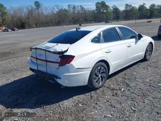 2023 Hyundai Sonata Hybrid Blue with VIN KMHL24JJ7PA069421, listed as a IAAI auction lot 41588205 with 9,650 mi miles. Bid and sale history available at carsss.com. Image 4.