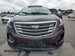 2018 Cadillac XT5 Premium Luxury FWD z VIN 1GYKNERS5JZ127703, wystawiony jako Copart lot #58315215 z przebiegiem Nie podano mil oraz Szkoda całkowita • Salvage title. Historia ofert i sprzedaży dostępna na DreamBid. Obrazek 5.