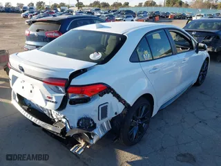 2024 Toyota Corolla Hybrid LE with VIN JTDBCMFE3R3044984, listed as a IAAI auction lot 41593723 with 1,702 mi miles. Bid and sale history available at carsss.com. Image 4.
