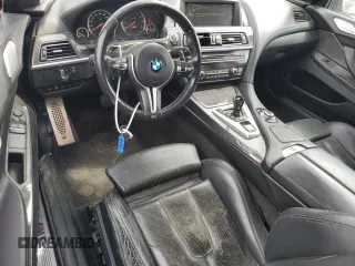 2014 BMW M6 z VIN WBSLX9C59ED160536, wystawiony jako Copart lot #55142095 z przebiegiem 78 550 mil mil oraz Tytuł czysty. Historia ofert i sprzedaży dostępna na DreamBid. Obrazek 8.