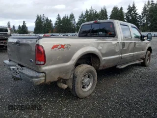 2003 Ford F-350 XL with VIN 1FTSW31F13EA13259, listed as a Copart auction lot 80345954 with 209,898 mi miles and Salvage title. Bid and sale history available at DreamBid. Image 3.