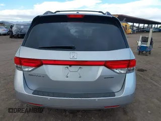 2014 Honda Odyssey Touring with VIN 5FNRL5H93EB066162, listed as a IAAI auction lot 41734783 with 173,063 mi miles and . Bid and sale history available at DreamBid. Image 16.