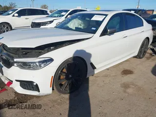 2018 BMW 5 Series M550i xDrive with VIN WBAJB9C54JB050218, listed as a IAAI auction lot 41132695 with 69,659 mi miles. Bid and sale history available at carsss.com. Image 16.