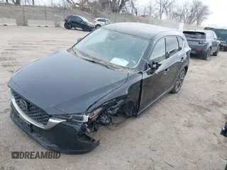 2023 Mazda CX-5 S Premium with VIN JM3KFBDM2P0221973, listed as a IAAI auction lot 41853756 with Not Provided miles and . Bid and sale history available at DreamBid. Image 19.