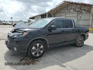 2017 Honda Ridgeline RTL with VIN 5FPYK2F51HB001058, listed as a Copart auction lot 55753865 with 113,539 mi miles and Clean title. Bid and sale history available at DreamBid. Image 1.
