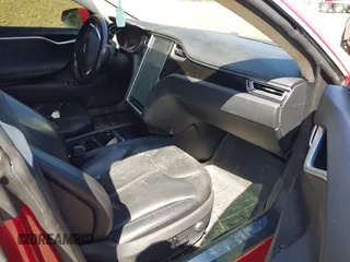 2014 Tesla Model S 60 with VIN 5YJSA1H11EFP37791, listed as a IAAI auction lot 41995504 with 84,371 mi miles and . Bid and sale history available at DreamBid. Image 5.