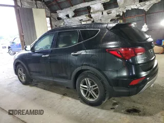 2017 Hyundai Santa Fe 2.4L with VIN 5NMZUDLB1HH013853, listed as a Copart auction lot 62577715 with 65,336 mi miles and Salvage title. Bid and sale history available at DreamBid. Image 2.