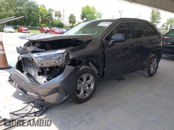 2023 Toyota RAV4 Hybrid LE with VIN JTMLWRFV6PD203044, listed as a IAAI auction lot 42320080 with 95,747 mi miles and . Bid and sale history available at DreamBid. Image 2.