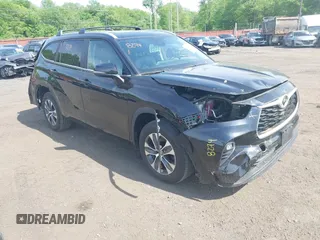 2023 Toyota Highlander L with VIN 5TDKDRBHXPS030361, listed as a IAAI auction lot 42230419 with 59,404 mi miles and . Bid and sale history available at DreamBid. Image 1.