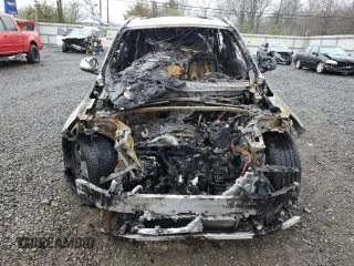 2025 BMW X1 xDrive28i z VIN WBX73EF04S5205310, wystawiony jako Copart lot #51547245 z przebiegiem Nie podano mil oraz Szkody całkowita. Historia ofert i sprzedaży dostępna na DreamBid. Obrazek 5.