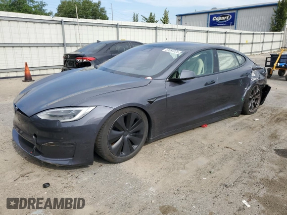 2022 Tesla Model S with VIN 5YJSA1E5XNF471212, listed as a Copart auction lot 57384025 with Not provided miles and Salvage title. Bid and sale history available at DreamBid. Image 1.