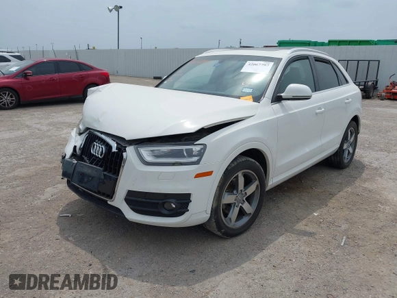 2015 Audi Q3 Premium Plus z VIN WA1EFCFS7FR006939, wystawiony jako IAAI lot #42067797 z przebiegiem 97 663 mil mil oraz . Historia ofert i sprzedaży dostępna na DreamBid. Obrazek 2.