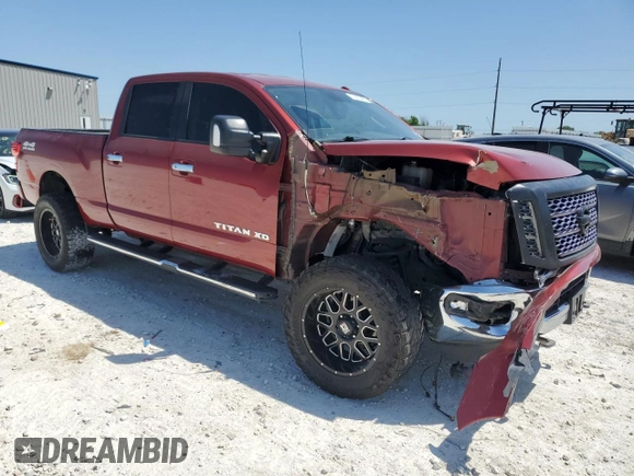 2017 Nissan Titan XD PRO-4X with VIN 1N6BA1F48HN516608, listed as a Copart auction lot 51453465 with 100,767 mi miles and Salvage Title. Bid and sale history available at carsss.com. Image 4.