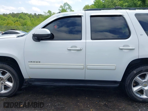 2012 Chevrolet Tahoe LT z VIN 1GNSCBE00CR176056, wystawiony jako IAAI lot #42091159 z przebiegiem 216 650 mil mil oraz . Historia ofert i sprzedaży dostępna na DreamBid. Obrazek 15.