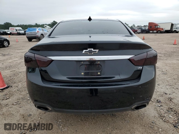 2014 Chevrolet Impala LTZ with VIN 1G1155S38EU145807, listed as a Copart auction lot 53116564 with 134,580 mi miles and Salvage Title. Bid and sale history available at DreamBid. Image 6.