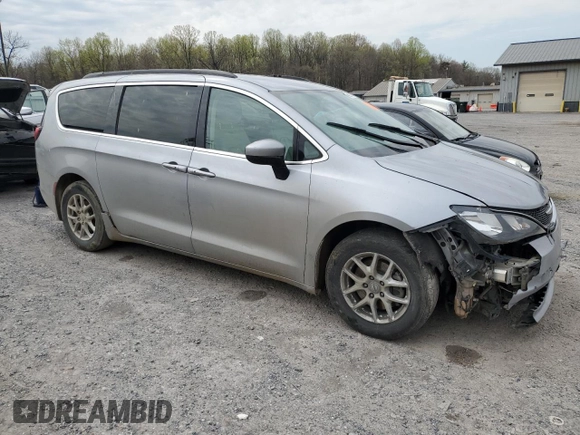 2021 Chrysler Voyager LXi with VIN 2C4RC1DG0MR521145, listed as a Copart auction lot 48062405 with 144,197 mi miles and Salvage Title. Bid and sale history available at DreamBid. Image 4.