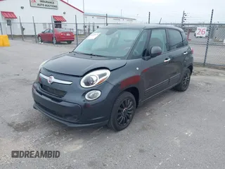 2014 FIAT 500L Easy with VIN ZFBCFABH1EZ011485, listed as a IAAI auction lot 41598470 with 69,036 mi miles and . Bid and sale history available at DreamBid. Image 2.