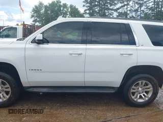 2016 Chevrolet Tahoe LT with VIN 1GNSKBKC0GR227451, listed as a IAAI auction lot 42241120 with 243,354 mi miles and . Bid and sale history available at DreamBid. Image 14.