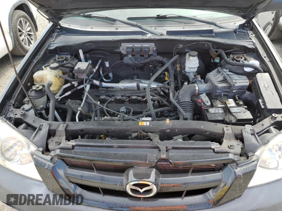 2005 Mazda Tribute i with VIN 4F2YZ02Z05KM51509, listed as a Copart auction lot 75985994 with Not Provided miles and Salvage Title. Bid and sale history available at carsss.com. Image 12.