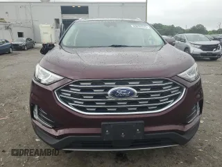 2019 Ford Edge SEL with VIN 2FMPK4J92KBB34891, listed as a Copart auction lot 60050945 with 104,942 mi miles and Salvage title. Bid and sale history available at DreamBid. Image 5.