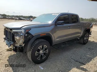 2024 GMC Canyon 4WD AT4 with VIN 1GTP6DEK9R1116173, listed as a Copart auction lot 71005134 with 5,298 mi miles and Salvage Title. Bid and sale history available at carsss.com. Image 1.