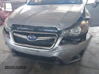 2016 Subaru Crosstrek Premium with VIN JF2GPADC5GH214564, listed as a IAAI auction lot 42567468 with 67,014 mi miles and . Bid and sale history available at DreamBid. Image 6.