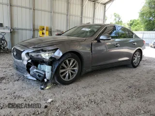 2014 Infiniti Q50 Premium with VIN JN1BV7APXEM688882, listed as a Copart auction lot 60543615 with 194,565 mi miles and Non repairable. Bid and sale history available at DreamBid. Image 1.