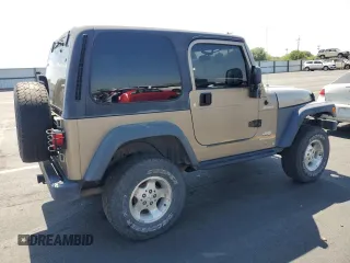 2003 Jeep Wrangler Sport z VIN 1J4FA49S43P327283, wystawiony jako Copart lot #59036295 z przebiegiem 158 108 mil mil oraz Szkoda całkowita • Salvage title. Historia ofert i sprzedaży dostępna na DreamBid. Obrazek 3.