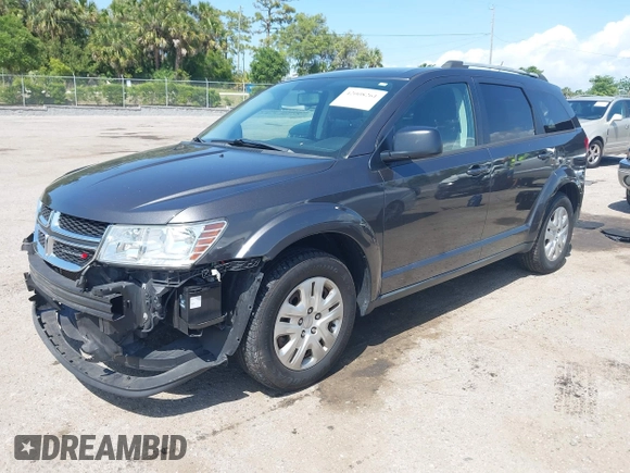 2017 Dodge Journey SE with VIN 3C4PDCAB2HT579852, listed as a IAAI auction lot 42008261 with 112,234 mi miles and . Bid and sale history available at DreamBid. Image 17.