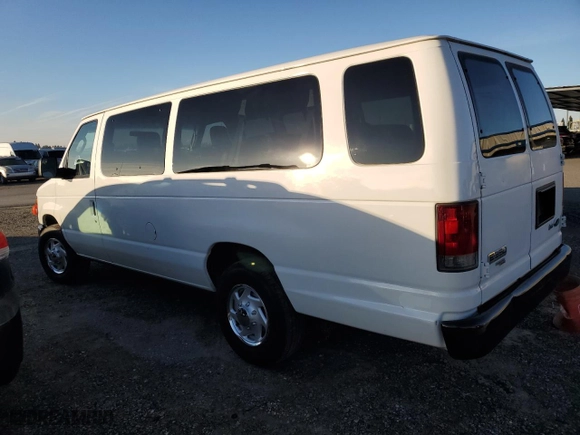 2010 Ford Econoline Wagon XL with VIN 1FBSS3BL3ADA73213, listed as a Copart auction lot 87754975 with 313,363 mi miles and Clean Title. Bid and sale history available at carsss.com. Image 2.