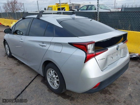 2019 Toyota Prius L Eco with VIN JTDKARFUXK3085578, listed as a IAAI auction lot 41073531 with 104,445 mi miles. Bid and sale history available at carsss.com. Image 3.