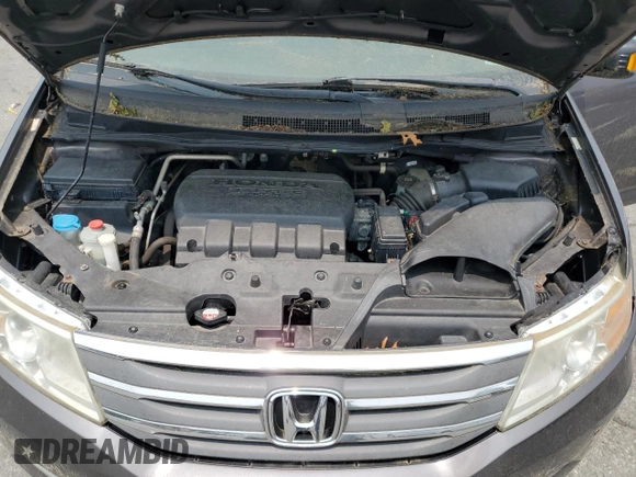2013 Honda Odyssey Touring with VIN 5FNRL5H98DB053891, listed as a Copart auction lot 59592425 with 174,773 mi miles and Clean title. Bid and sale history available at DreamBid. Image 12.