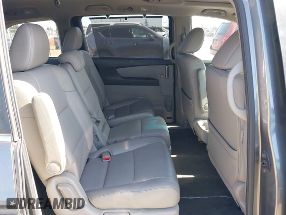 2012 Honda Odyssey EX-L with VIN 5FNRL5H6XCB061026, listed as a IAAI auction lot 42574612 with 144,480 mi miles and . Bid and sale history available at DreamBid. Image 8.