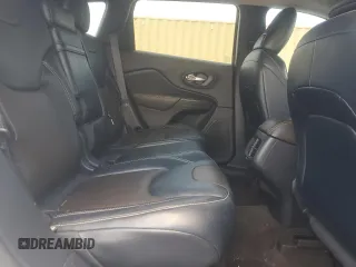 2014 Jeep Cherokee Limited z VIN 1C4PJLDS2EW261465, wystawiony jako Copart lot #62859445 z przebiegiem Nie podano mil oraz Szkoda całkowita • Salvage title. Historia ofert i sprzedaży dostępna na DreamBid. Obrazek 11.