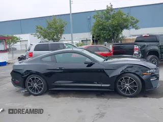 2022 Ford Mustang EcoBoost with VIN 1FA6P8THXN5145312, listed as a IAAI auction lot 42075186 with 28,233 mi miles and . Bid and sale history available at DreamBid. Image 14.