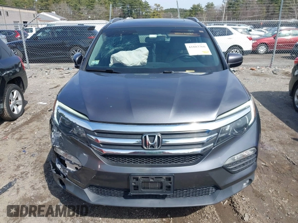 2017 Honda Pilot EX-L with VIN 5FNYF6H5XHB009029, listed as a IAAI auction lot 41883366 with 95,711 mi miles and . Bid and sale history available at DreamBid. Image 12.