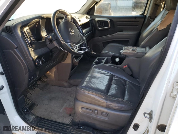 2011 Honda Ridgeline RTL with VIN 5FPYK1F52BB010305, listed as a Copart auction lot 49371755 with 287,168 mi miles and Salvage Title. Bid and sale history available at carsss.com. Image 7.