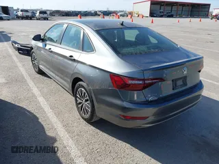 2021 Volkswagen Jetta S z VIN 3VWC57BU8MM098931, wystawiony jako IAAI lot #41818622 z przebiegiem 10 469 mil mil oraz . Historia ofert i sprzedaży dostępna na DreamBid. Obrazek 3.