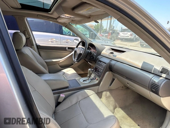 2003 Infiniti G35 w/Leather with VIN JNKCV51E73M000353, listed as a Copart auction lot 73202104 with 240,207 mi miles and Clean Title. Bid and sale history available at DreamBid. Image 5.
