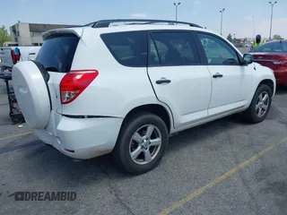 2007 Toyota RAV4 with VIN JTMZK33V875013053, listed as a IAAI auction lot 42133759 with 142,572 mi miles. Bid and sale history available at carsss.com. Image 4.