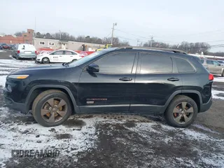 2016 Jeep Cherokee Latitude with VIN 1C4PJMCS1GW326557, listed as a IAAI auction lot 41474801 with 207,805 mi miles. Bid and sale history available at carsss.com. Image 14.