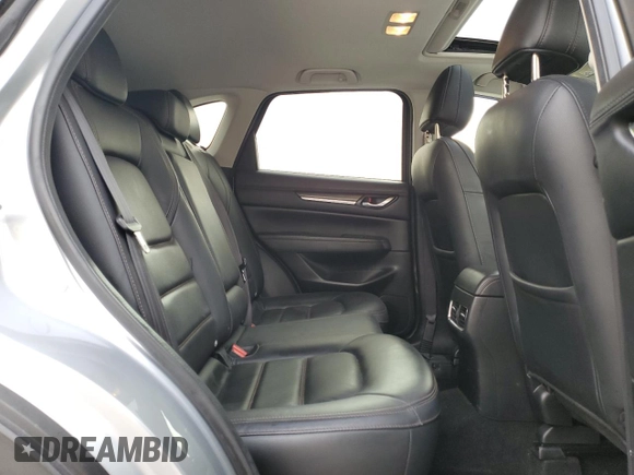 2021 Mazda CX-5 Grand Touring with VIN JM3KFADM8M1339008, listed as a Copart auction lot 49150115 with 144,851 mi miles and Salvage Title. Bid and sale history available at carsss.com. Image 11.