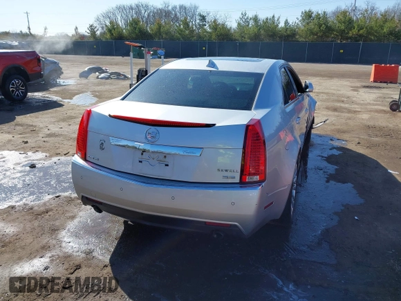 2013 Cadillac CTS Premium with VIN 1G6DP5E39D0100975, listed as a IAAI auction lot 41915113 with 110,436 mi miles and . Bid and sale history available at DreamBid. Image 4.