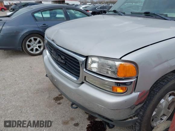 2004 GMC Yukon SLE z VIN 1GKEC13Z54J265434, wystawiony jako IAAI lot #41155633 z przebiegiem 331 908 mil mil oraz . Historia ofert i sprzedaży dostępna na DreamBid. Obrazek 6.