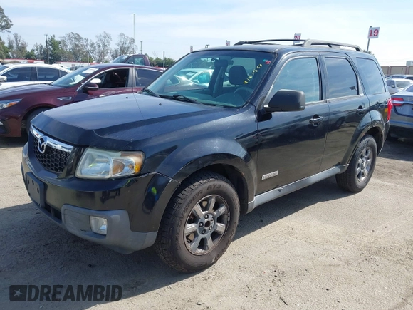 2008 Mazda Tribute Sport with VIN 4F2CZ02Z68KM15550, listed as a IAAI auction lot 41615133 with 215,803 mi miles and . Bid and sale history available at DreamBid. Image 2.