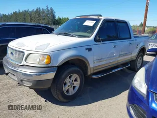 2001 Ford F-150 XLT with VIN 1FTRW08L21KC01442, listed as a IAAI auction lot 42163484 with 230,590 mi miles and . Bid and sale history available at DreamBid. Image 2.