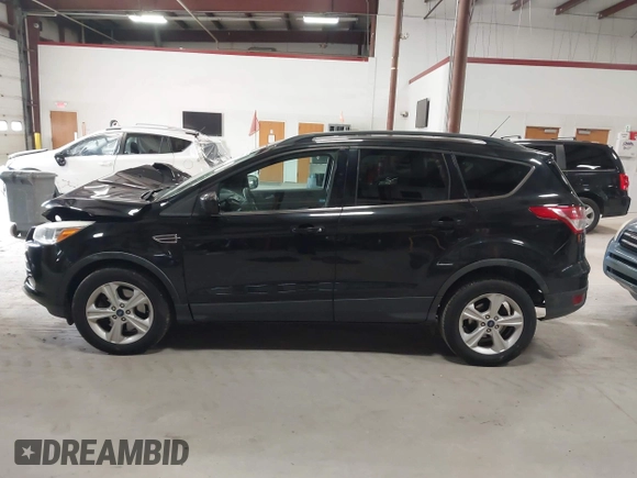2015 Ford Escape SE with VIN 1FMCU9G97FUA21287, listed as a IAAI auction lot 41990144 with 55,036 mi miles and . Bid and sale history available at DreamBid. Image 15.